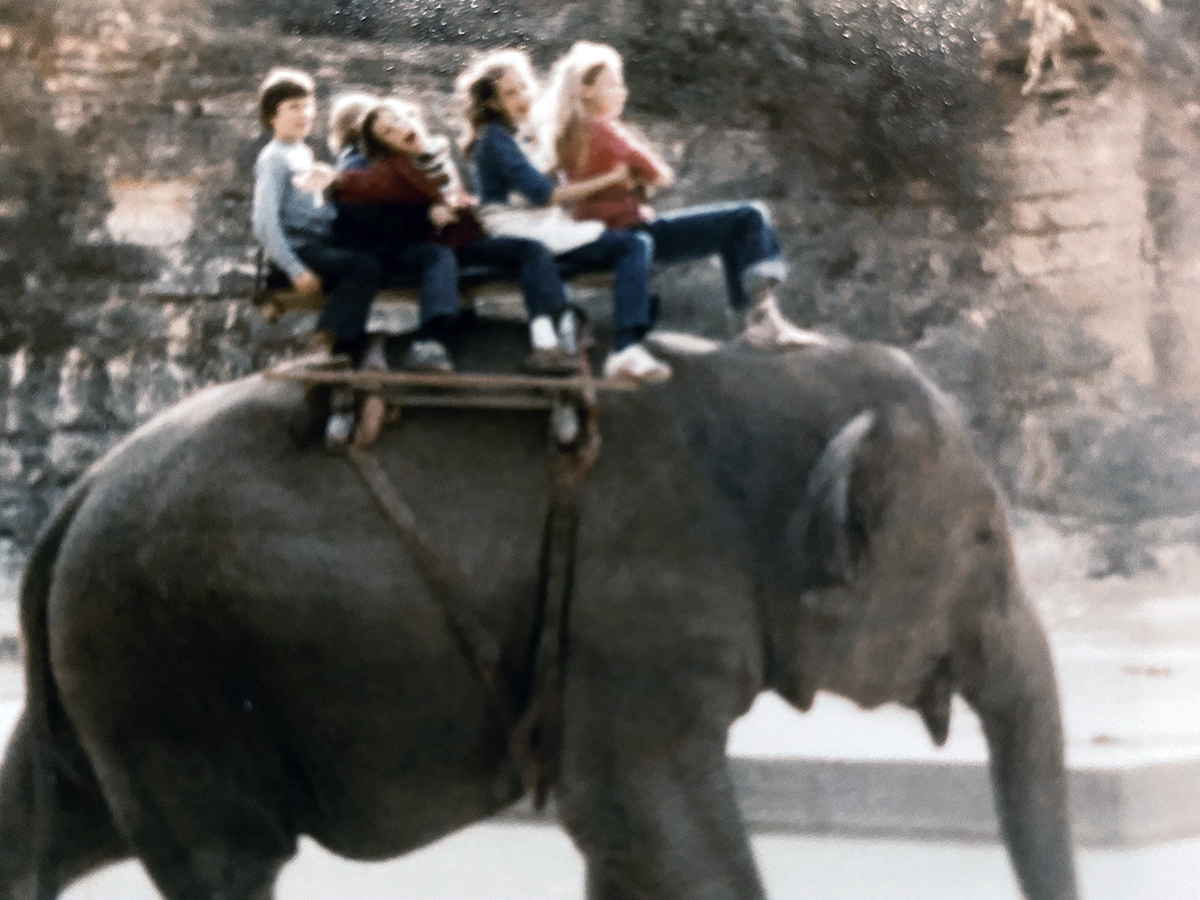 Bob Borson riding an elephant