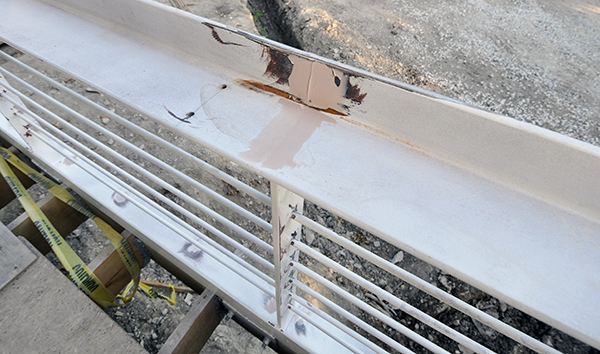 Bondo on a metal handrail