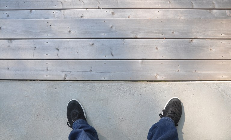 transition from the concrete terrace to the wood deck steps