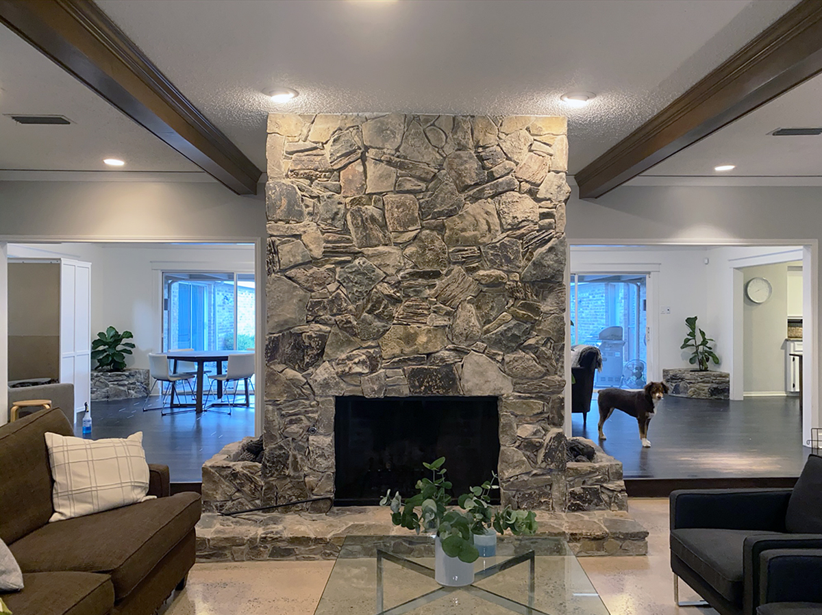 Existing Fireplace covered in stone