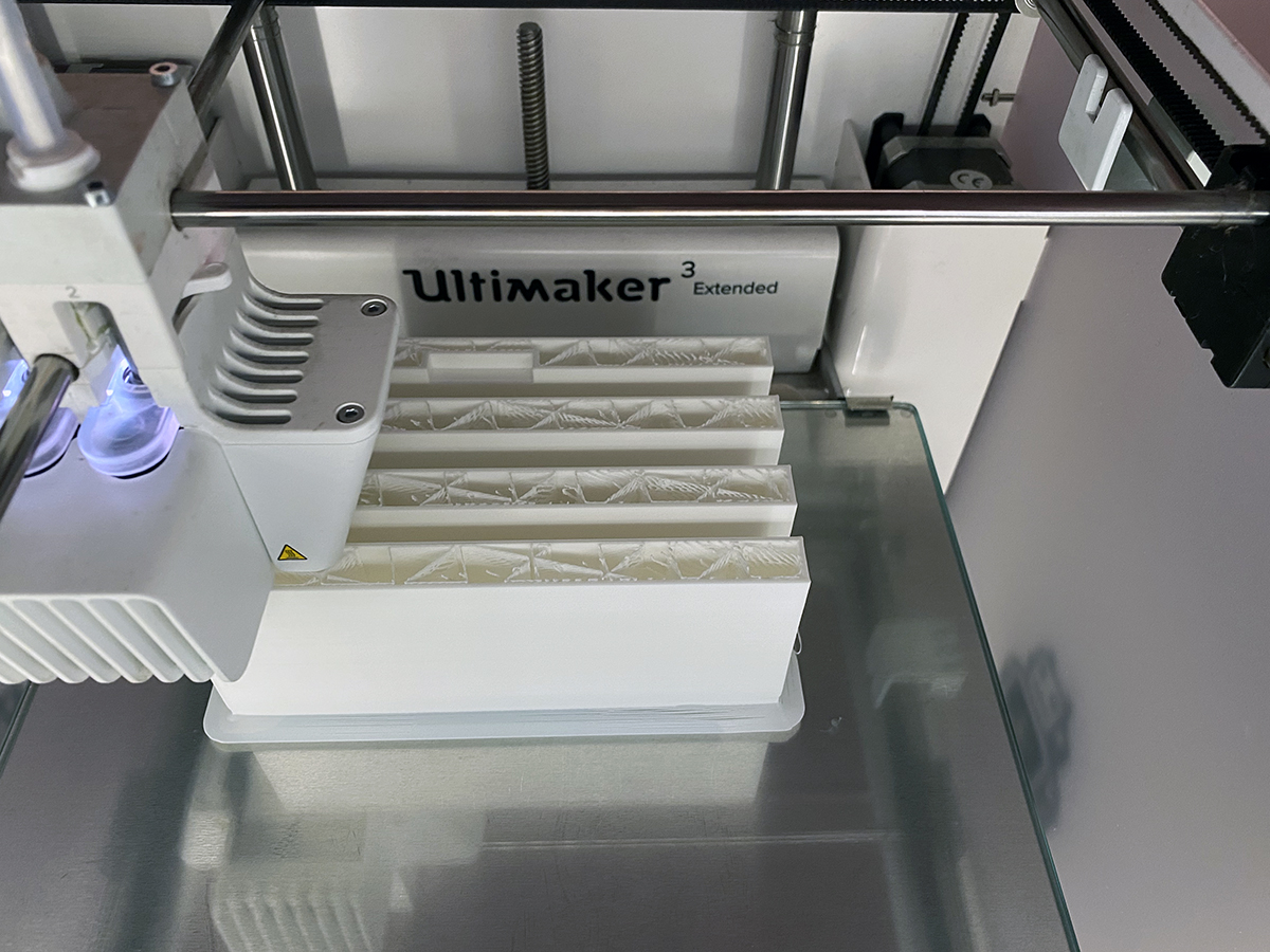 Ultimaker 3 Extended 3D Printer printing the site plan