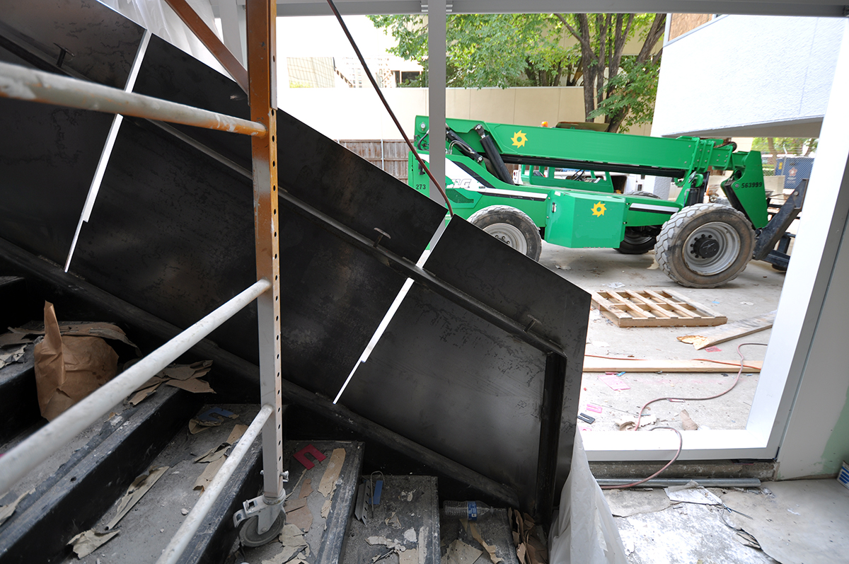 Work214 Ground level steel panel stair under construction