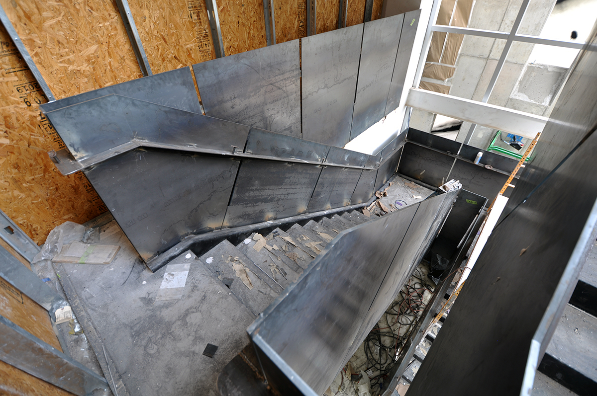 Work214 Ground level steel panel stair under construction